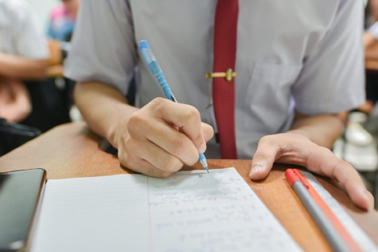 student-doing-class-assignment-taking-written-test-college_7572-33